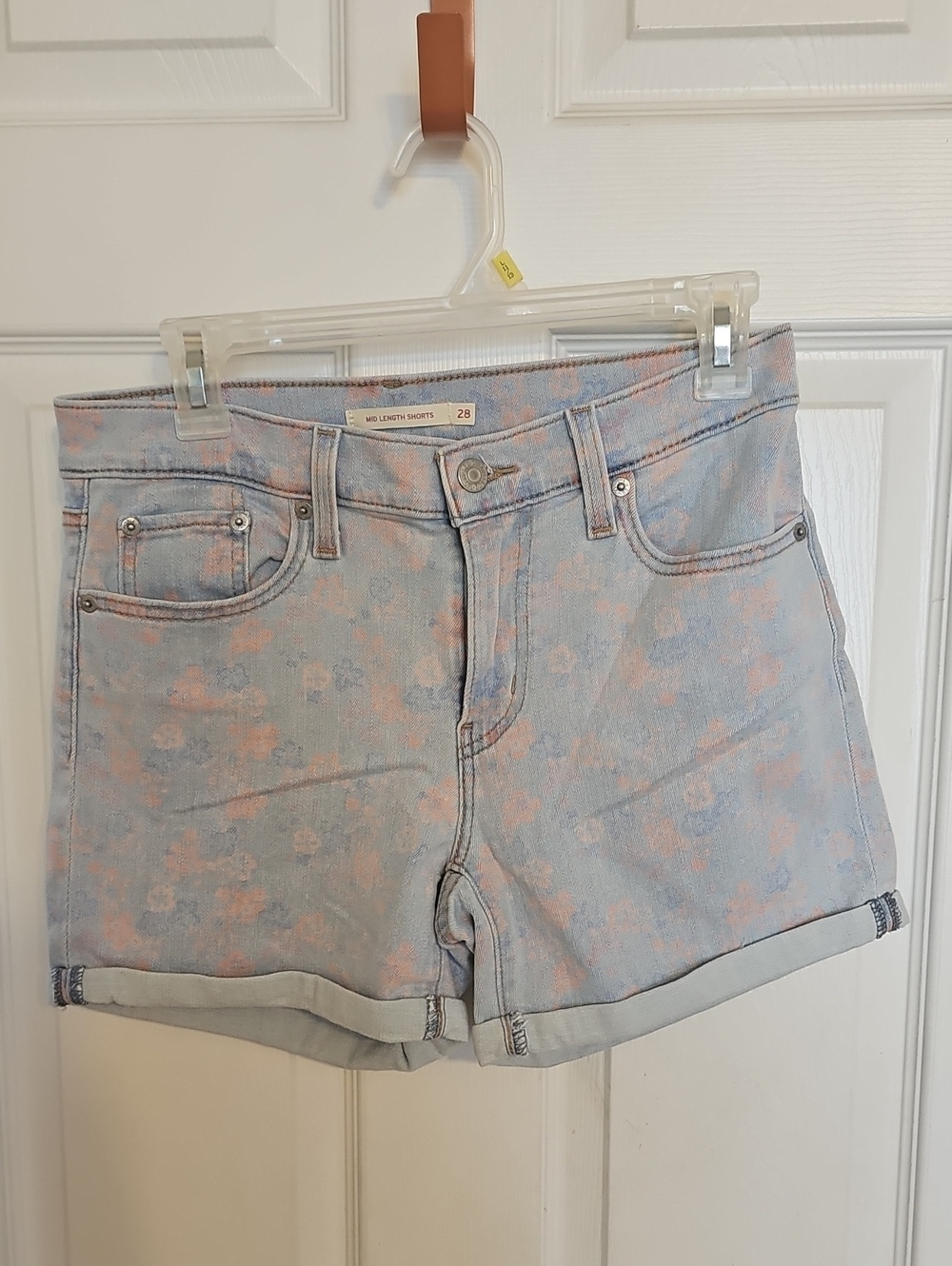 LEVI STRAUSS Women's Light Blue and Pink Floral Denim Shorts.